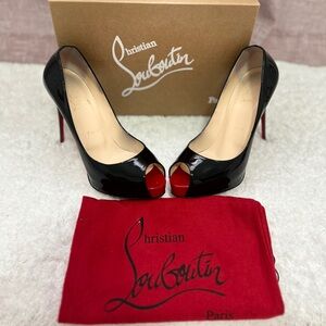 Christian Louboutin black Heels.